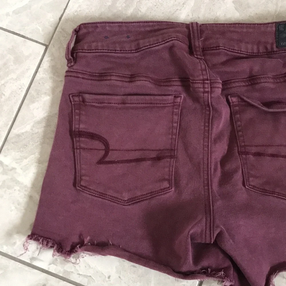 AMERICAN EAGLE Women Super Stretch Hi Rise Shortie Plum Denim Shorts | 4